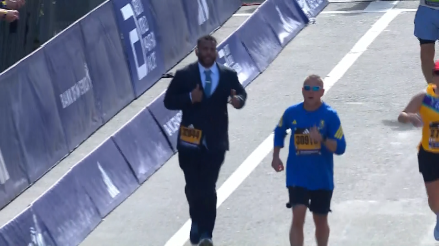 Providence man runs Boston Marathon in suit and tie